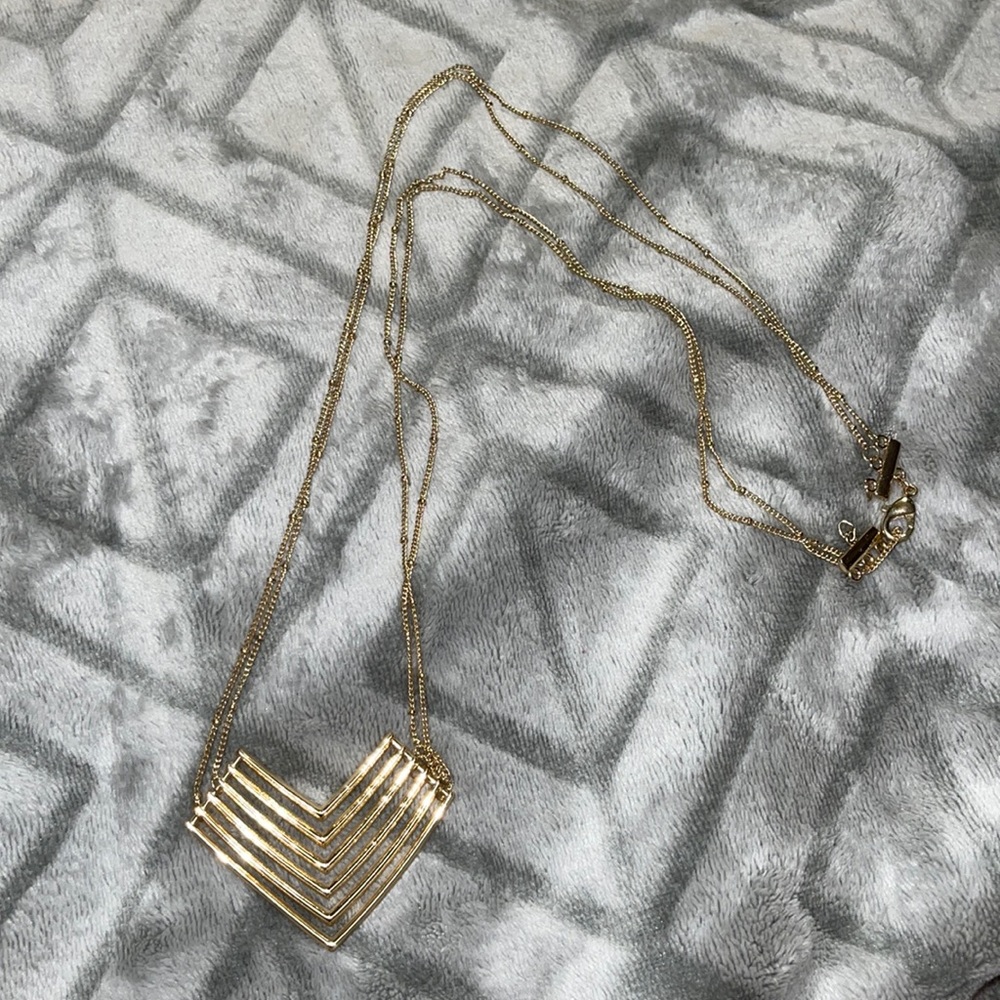 Long gold necklace